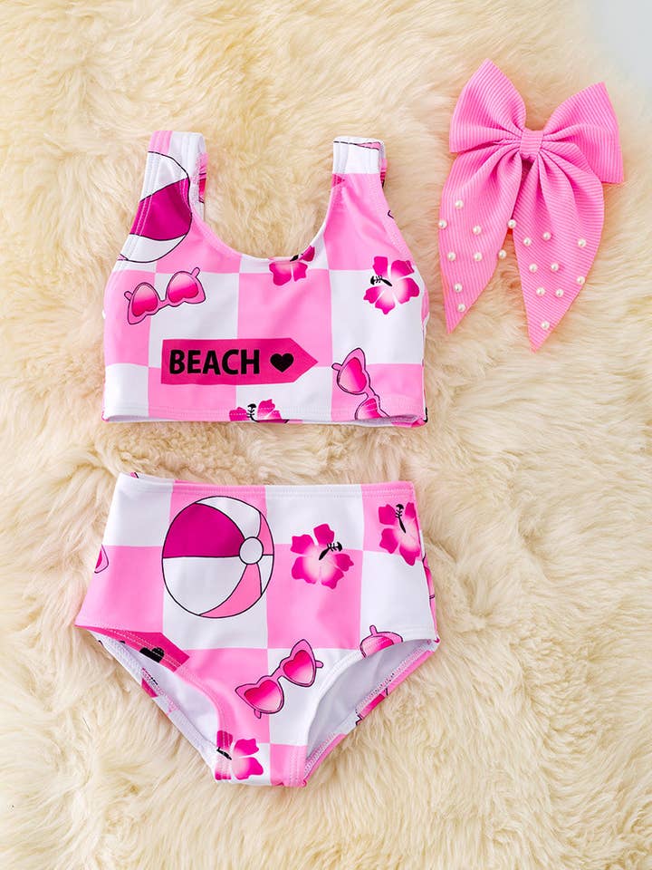 Pink & white checker printed girls swimsuit. SWG40095🏖️ SOL for wholesale by Kids Charm Online