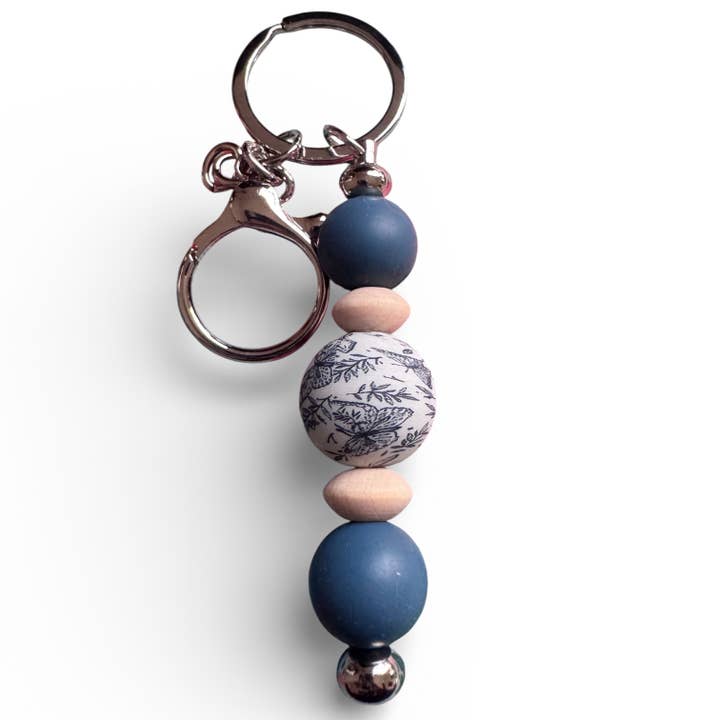 Sommerfuglehave-nøglering (Kopi) for engroshandel hos Dream State by Christie