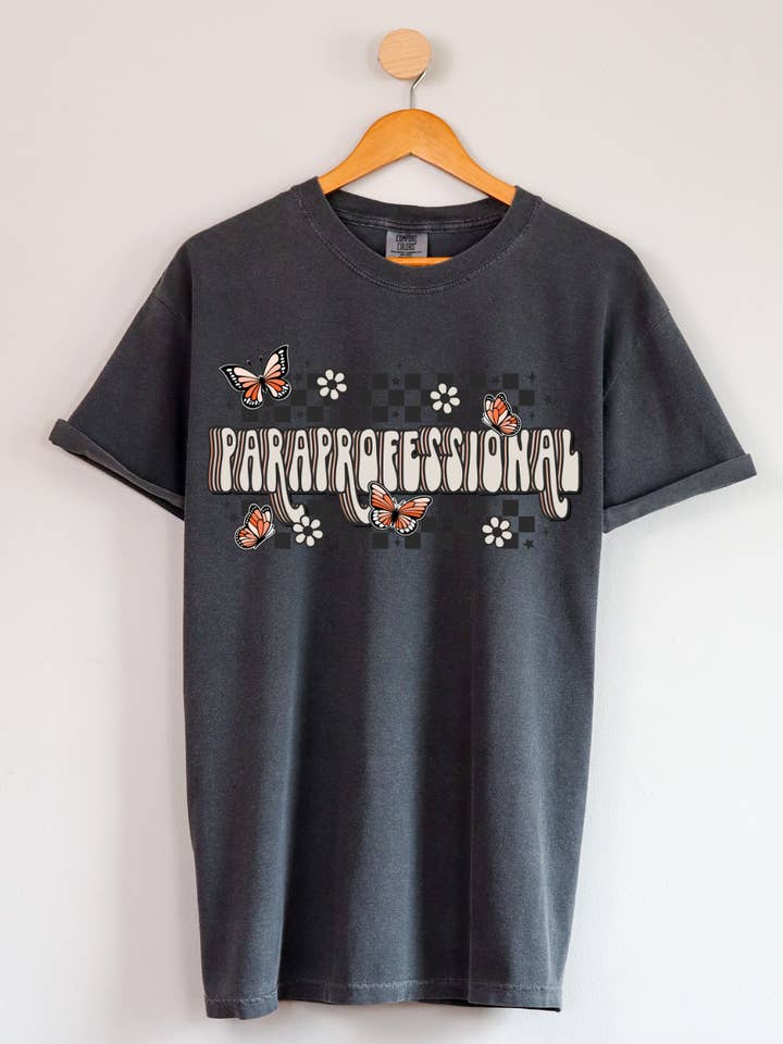 Pepper Retro Paraprofessional Graphic T-Shirt for wholesale on Faire
