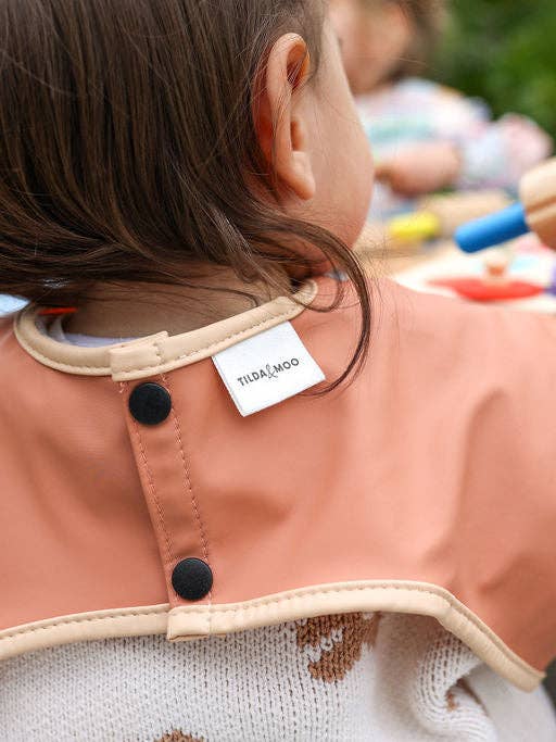 Peach Sorbet | Smock Bib for wholesale by Tilda & Moo