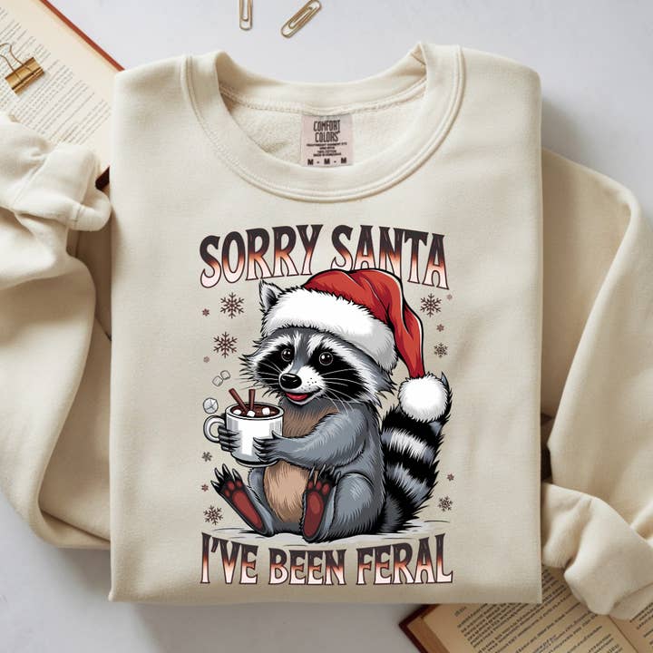Felpa "Sorry Santa" – Maglione Natalizio Divertente con Procione per la vendita all'ingrosso da parte di TheWorldOfMYes