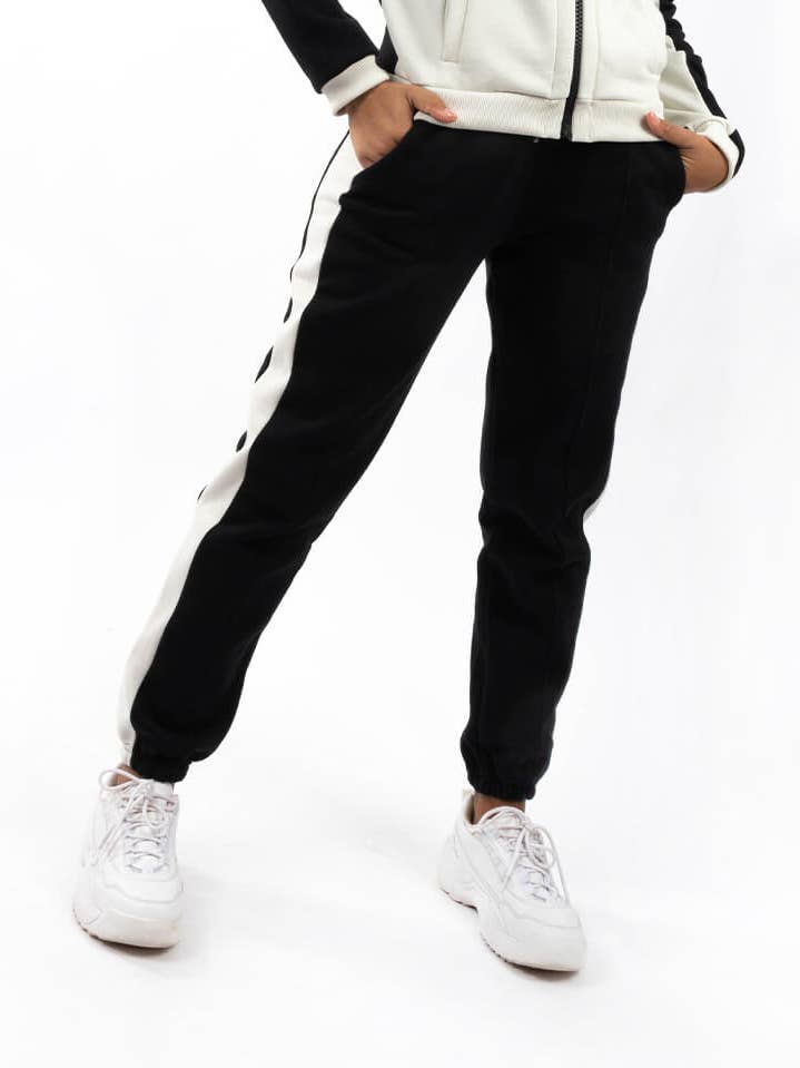 Pantaloni tuta Last Black per la vendita all'ingrosso da parte di StockNow Unipessoal