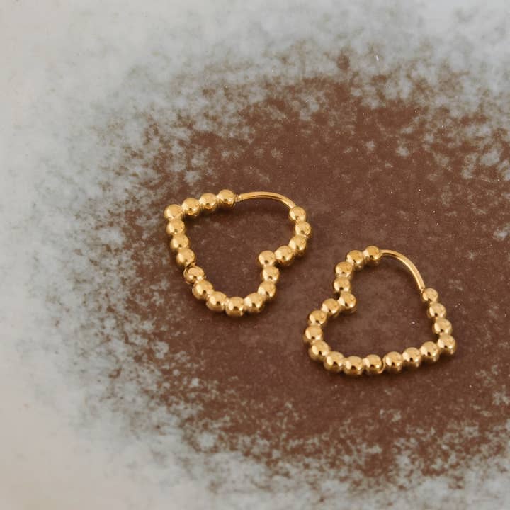 Maxine 18K Gold Non-Tarnish Petite Heart Earring and other Purchase Wholesale maxine. Free Returns & Net 60 Terms on Faire trending on Faire.