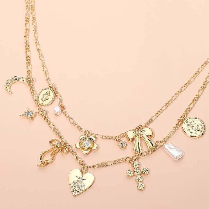 Bow Heart Floral Cross Pearl Crescent Coin Charm Station Layered Necklace for wholesale by Sensibling Corp.