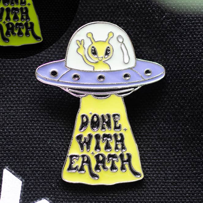 Glow in the Dark UFO Enamel Pin Badge for wholesale by Something Different Wholesale