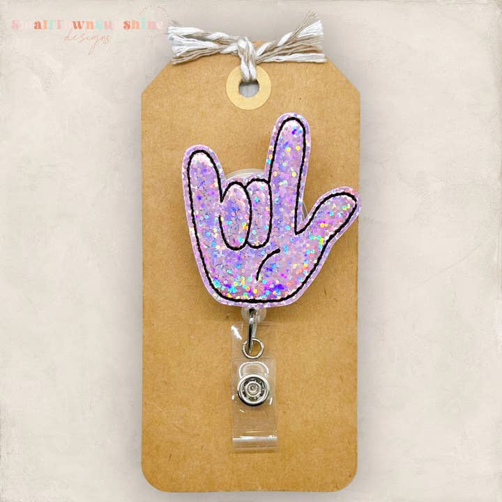 ASL I Love You Sign Badge Reel // Pink for wholesale by The SmallTownSunshine Company