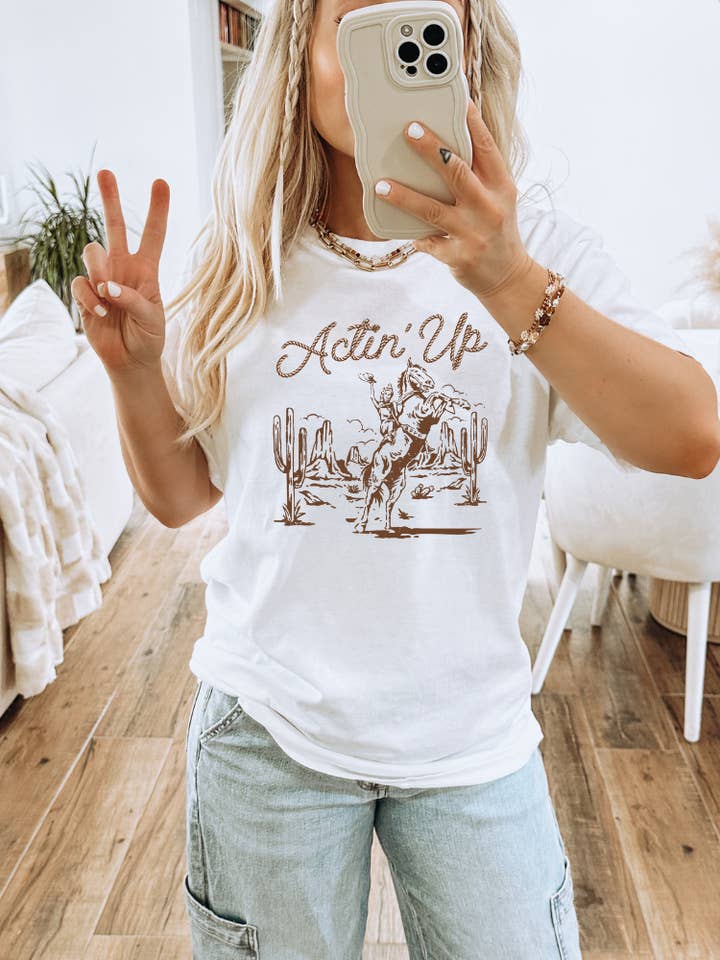 Acting Up Cowgirl Western Adult Graphic Tee for wholesale by Uncommon Label