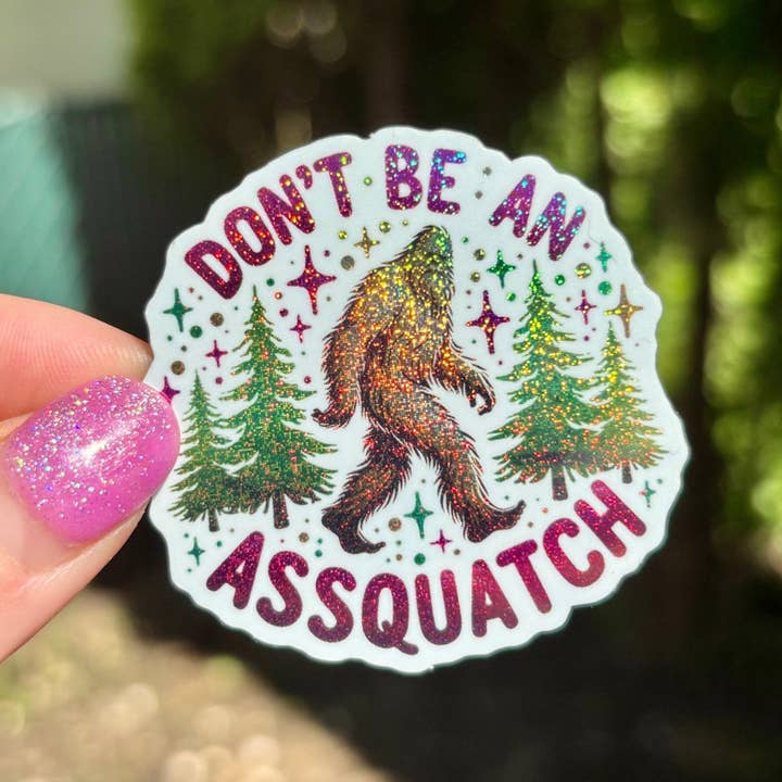 Don’t Be an Asssquatch Glitter Sticker for wholesale by Awfullynerdy.co