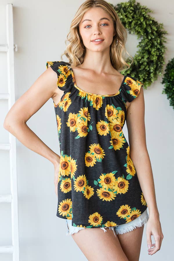 NERO TOP FLOREALE CON VOLANT in vendita all'ingrosso su Faire2