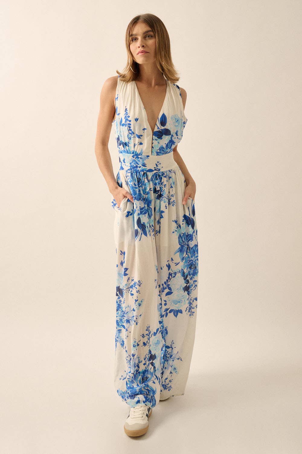 Off White Blue Plunging Neck Floral Woven Jumpsuit for wholesale on Faire6