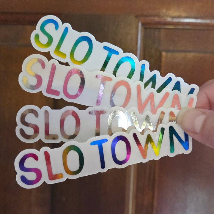 SLO Town Clear Foiled Sticker for wholesale by Lucky Dog Design Co.