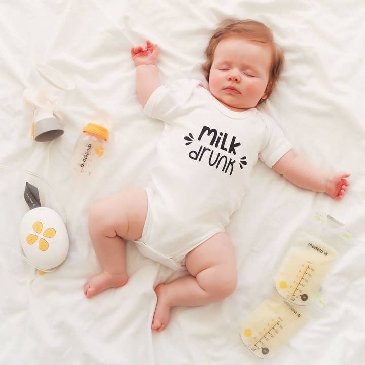 Milk drunk Baby vest for wholesale by Fred & Noah