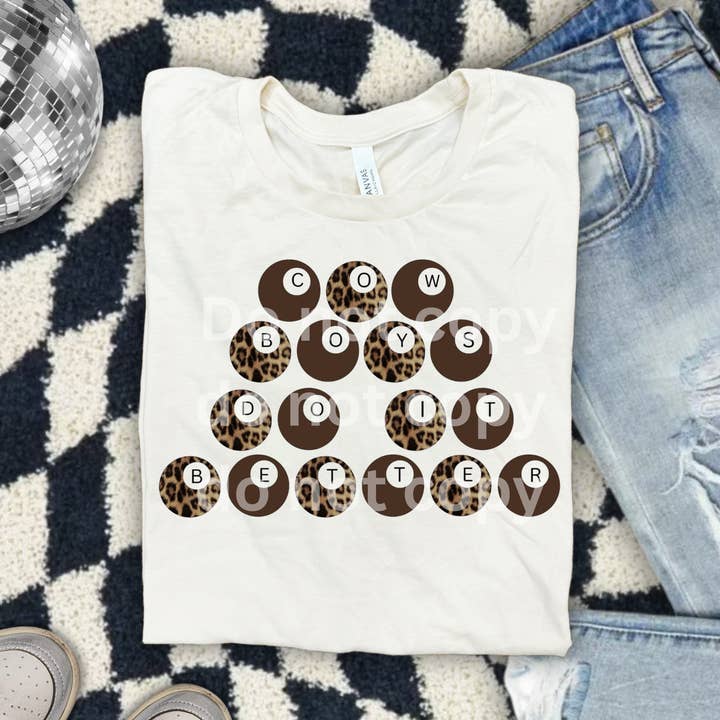 Cowboys do it better brown cheetah tee for wholesale by Rustic Rose Western Boutique