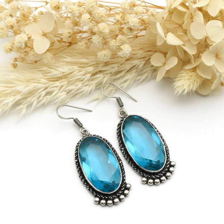 Blå topasörhängen för wholesale av Produtos Namasté