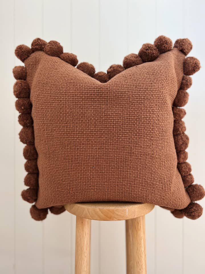 Woven Pom Pillow for wholesale by Collective Dwelling