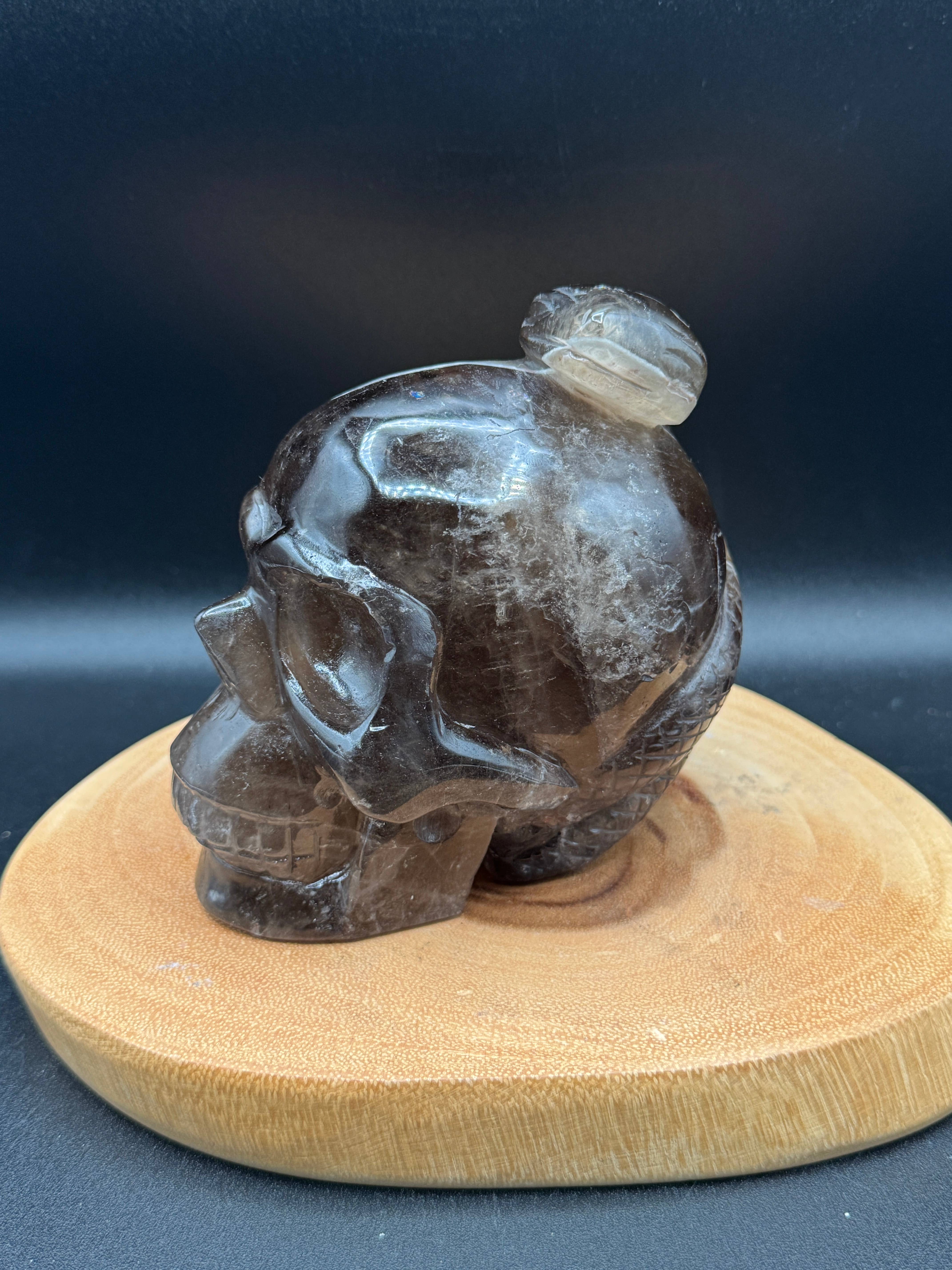 The 7 Directions - Wholesale Spiritual Stone/Crystal - 3.9 lb Unique Smoky skull w/ snake carving H362