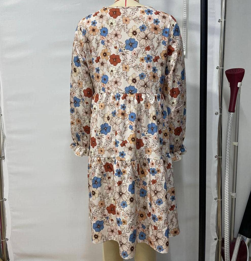 Apricot Floral print bohemian long-sleeves babydoll dress for wholesale on Faire2