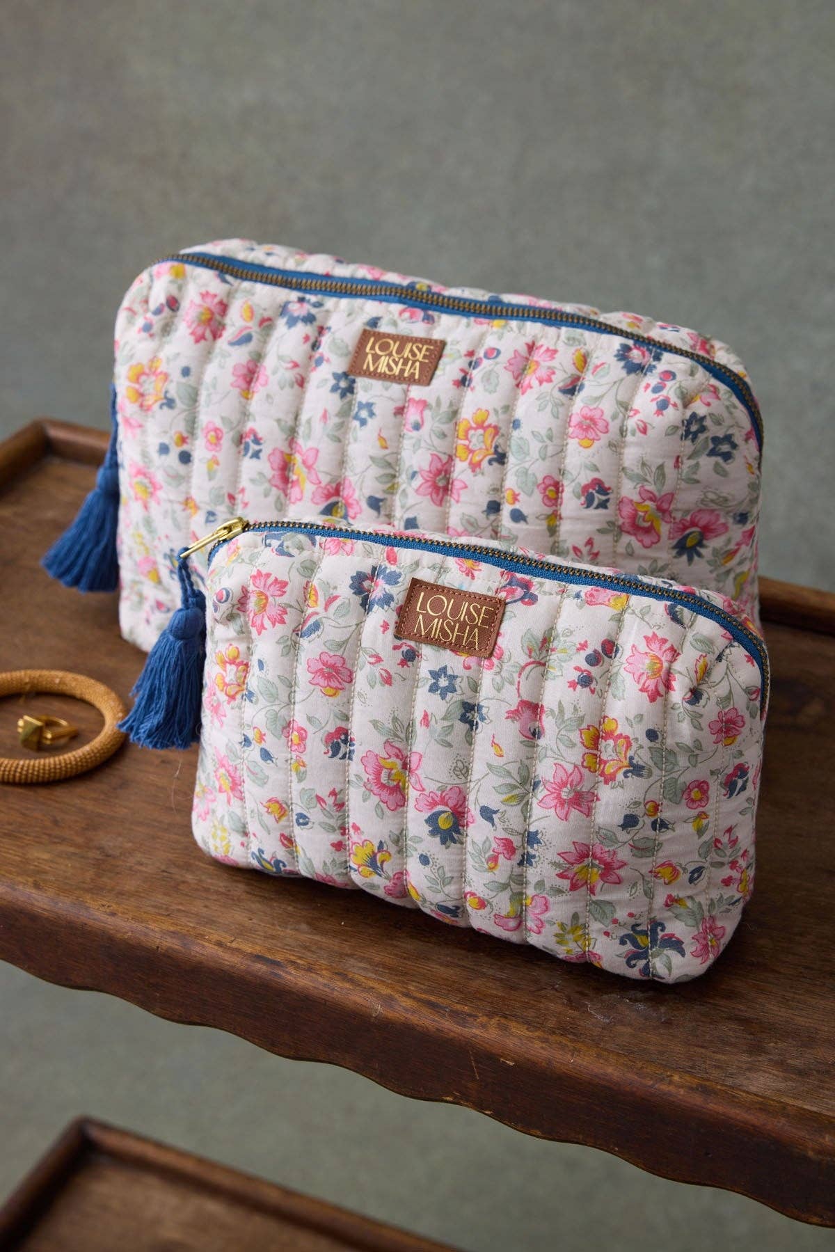 Cr me Fleurs Sauvages Teiki Pouch for wholesale on Faire4