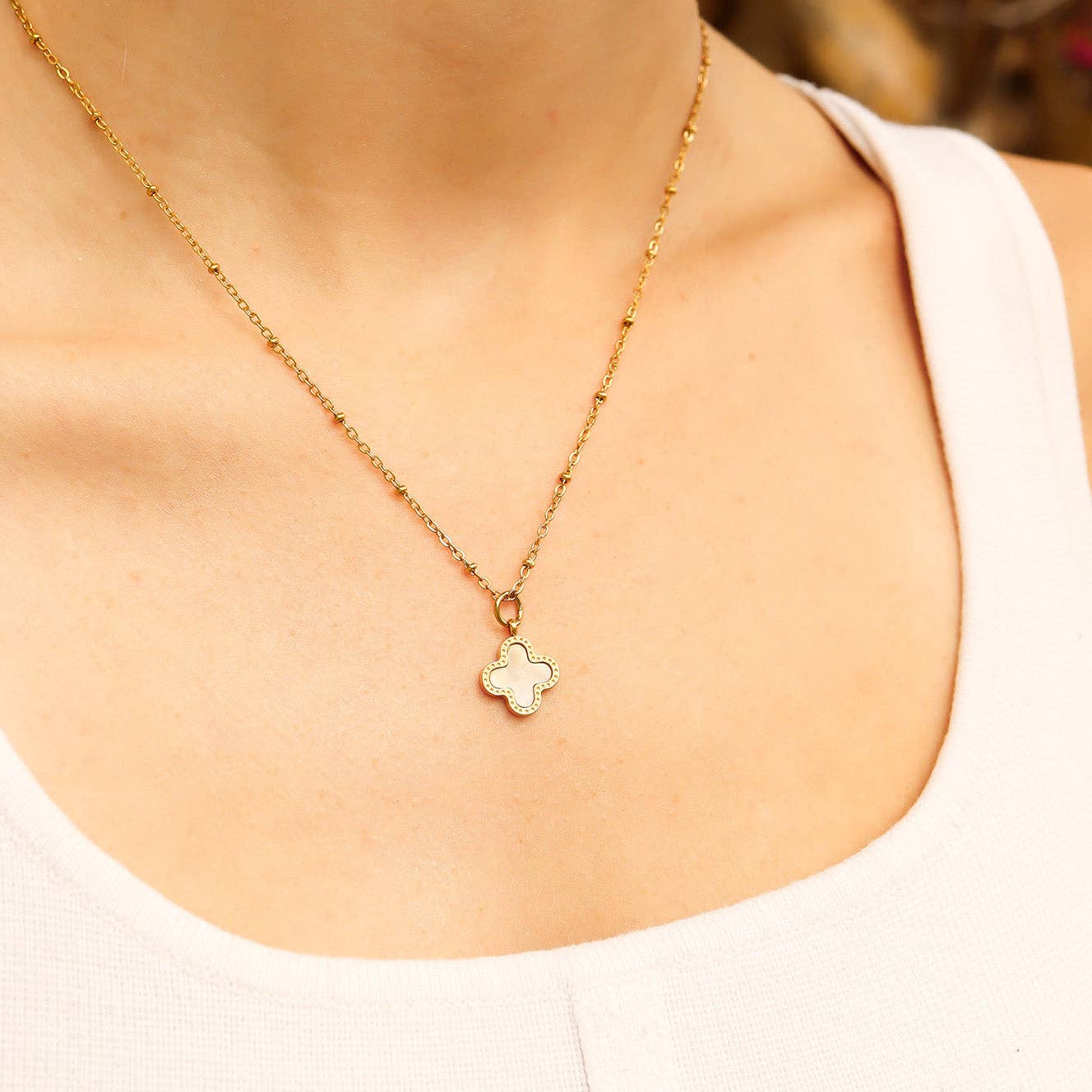 18K Gold PVD Stainless Steel Lucky Clover Charm for wholesale on Faire7