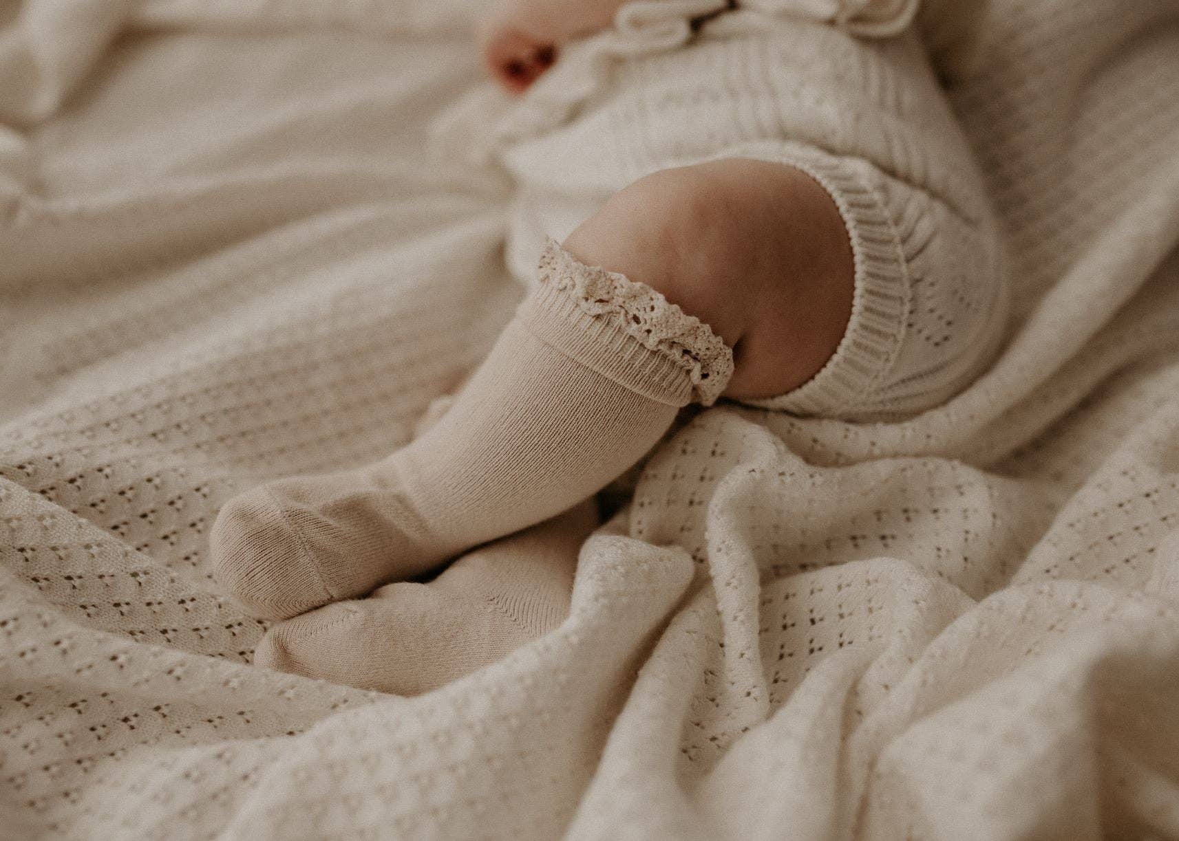 koffiemelk Crèmekleurige gebreide heirloom-deken voor groothandel op Faire3