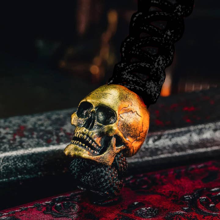 Black paracord Lanyard w/ Brass Skull Bead for wholesale by Lucky Jack