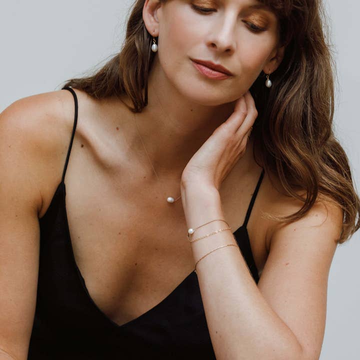 Wanderlust Life - Wholesale Halskettinghanger - Parelketting met fijn koord2