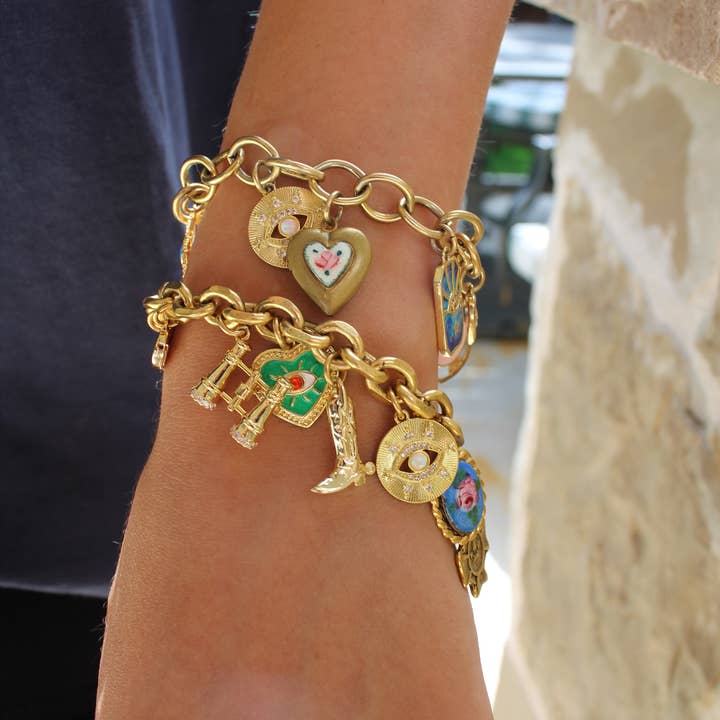 Antiqued Gold Charm Bracelet for wholesale on Faire