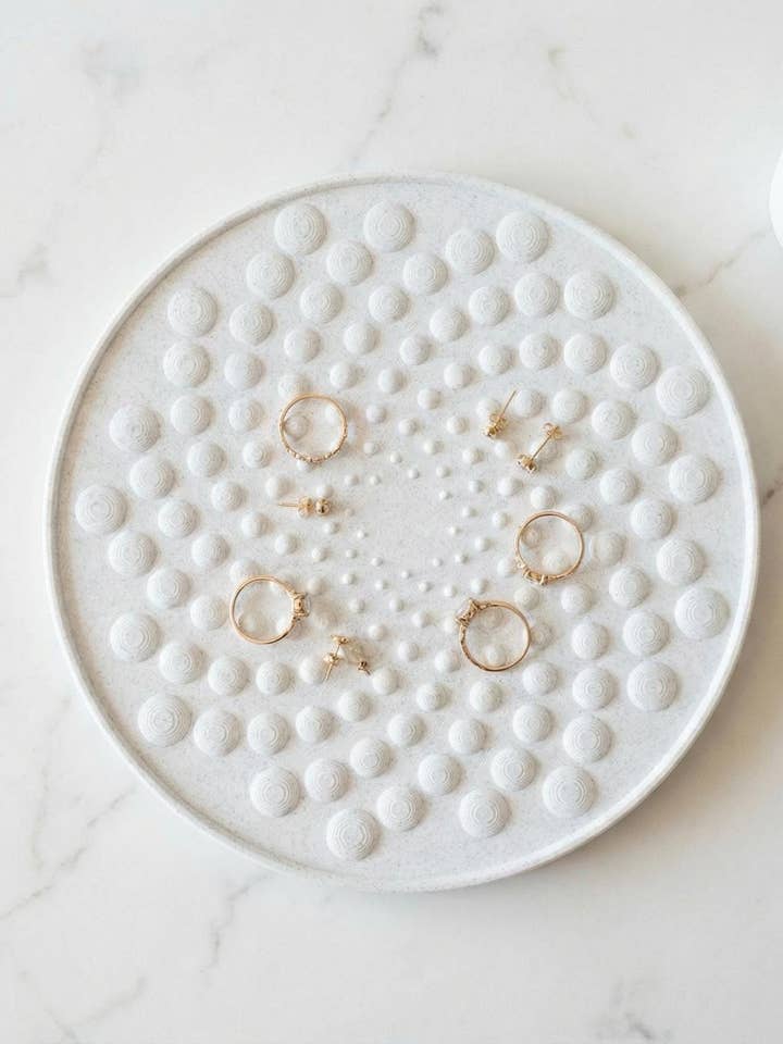 Marmor nipsbakke - rund småstensformet opsamlingsskål for engroshandel hos Meora Home