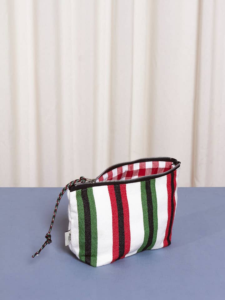 Green, red and black canary fabric toiletry bag for wholesale by Eturel Madrid
