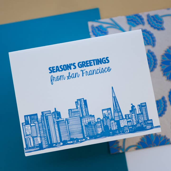 Season's Greetings Carte typographie Bleu Skyline pour la vente par Coffee n Cream Press