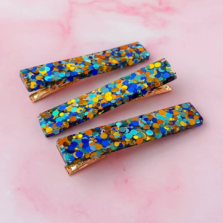 Hermes - Blue & Gold glitter resin hair clips for wholesale by ThatsSewLauraUk