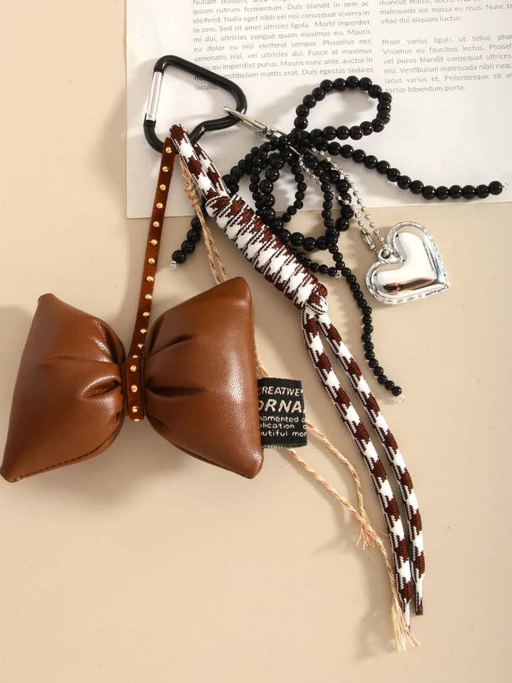 Sweet Bow Heart Braided Rope Bag Charm DP25E483 for wholesale by Dipped Shop