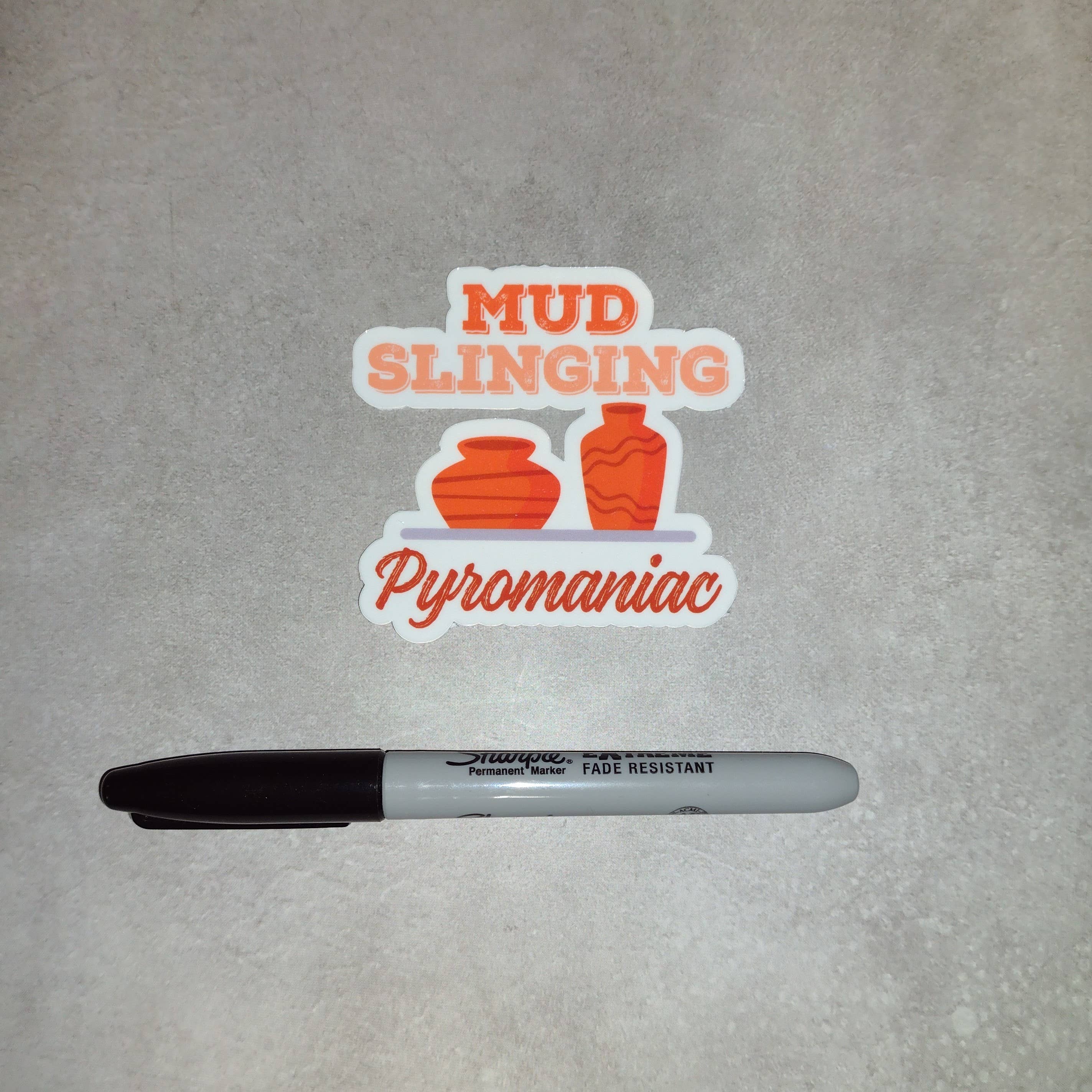 Dancing Dolphin Crafts – Engroshandel Klistermærke – Mudder Slinging Pyroman | Keramik klistermærke | Keramisk klistermærke3