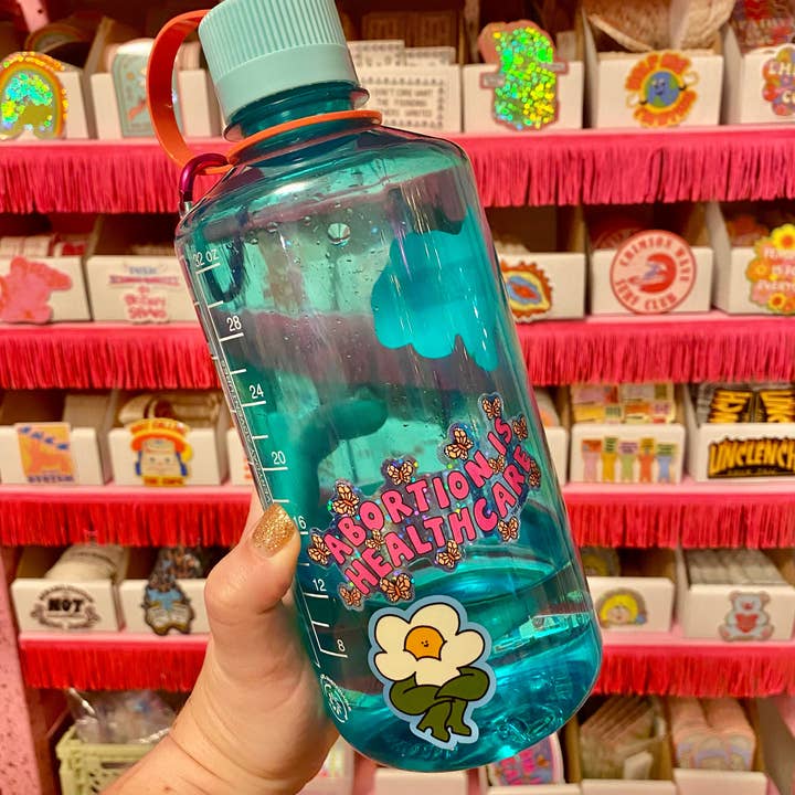 The Peach Fuzz - Wholesale Sticker - Abortion Is Healthcare Glitter Sticker2