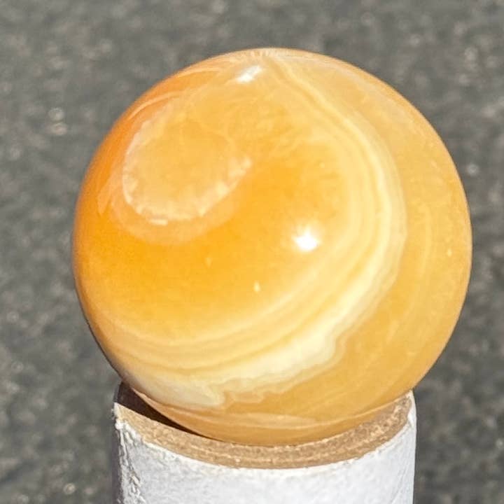 MANGO CALCITE SPHERES 20MM-30MM for wholesale by Metaphysical & Healing Crystals