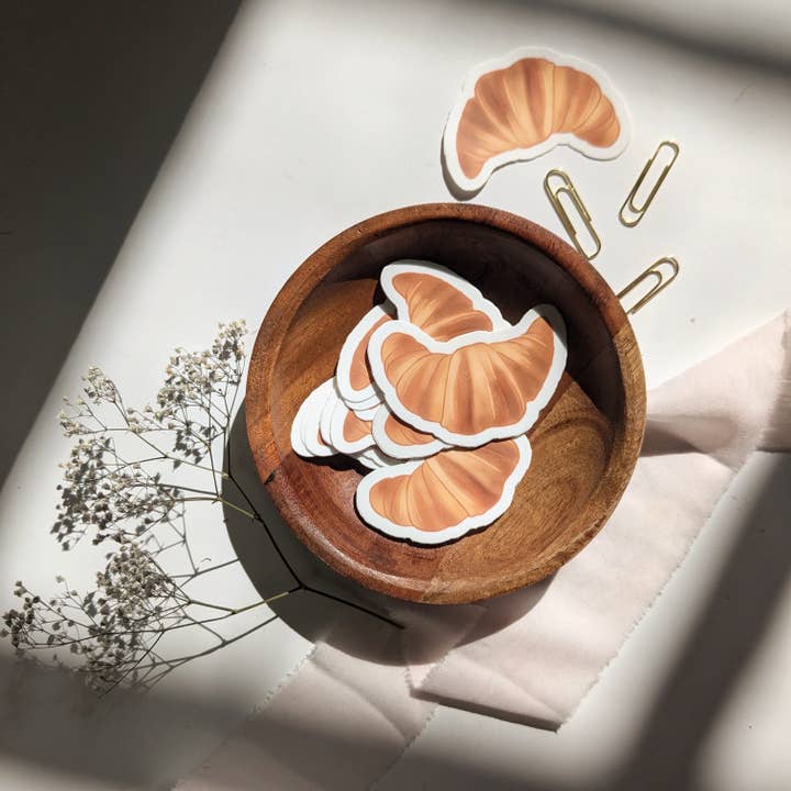 Croissant Vinyl Sticker for wholesale by Elizabeth Kirsteatter