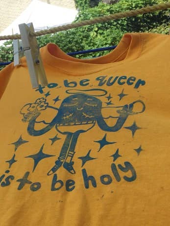 'To Be Queer Is To Be Holy" Long Sleeve Tee for wholesale by Samson Ceramic