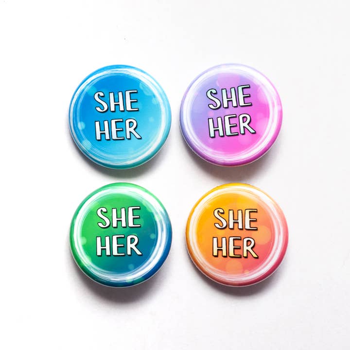 She/her pronoun pin / button for wholesale by Crafty Queer Studio