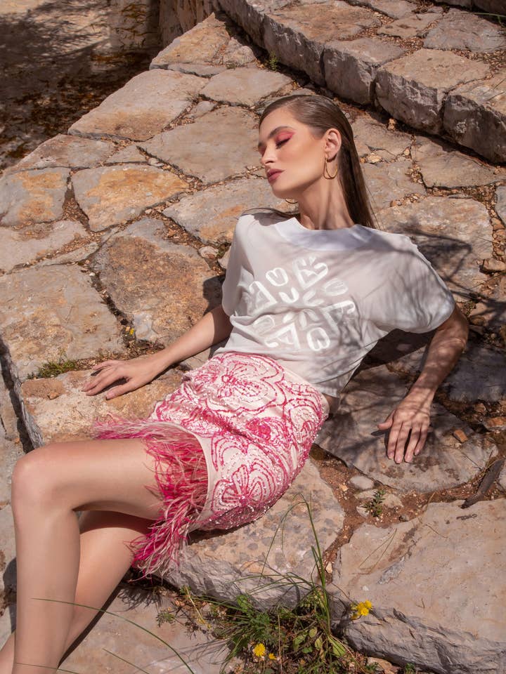 Chemise à logo pour la vente par Yasmina Fashion