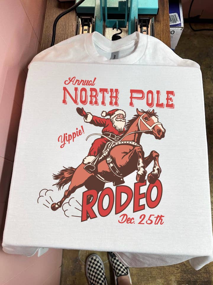 North Pole Rodeo Tee or Crewneck for wholesale by Gunpowder and Glam Boutique