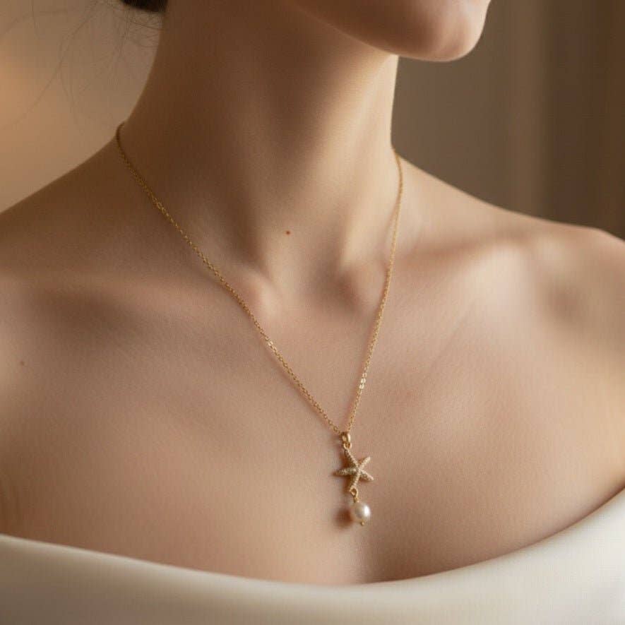 OE! – Großhandel Kette mit Anhänger/Charm – ASTEROIDEA - Halskette mit Seestern-Anhänger aus Zirkonia und Perle0