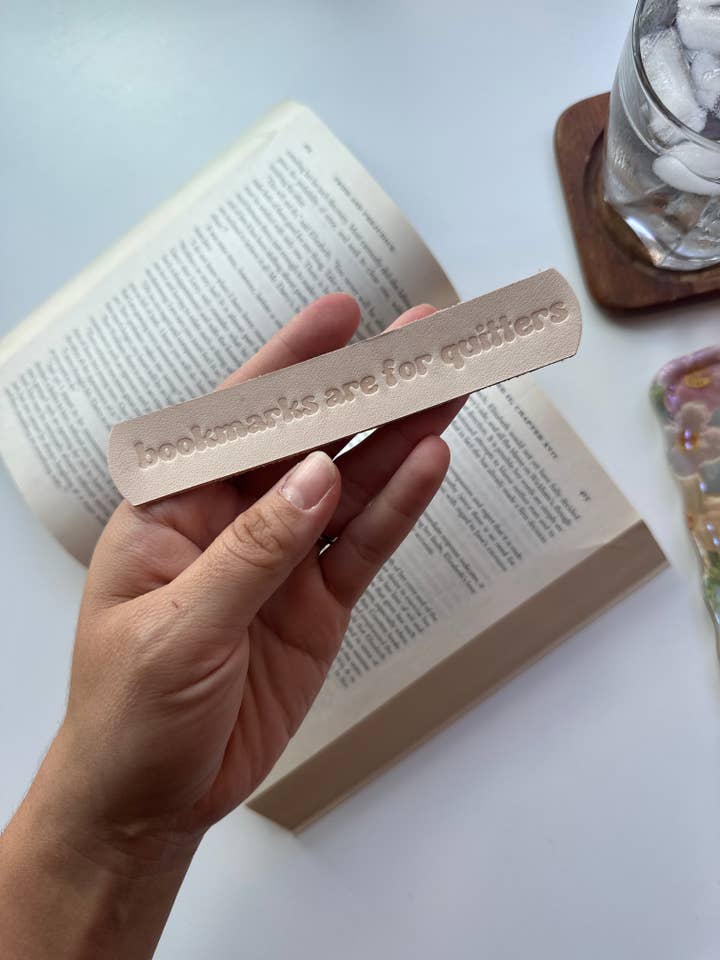 "Bookmarks are for Quitters" Bookmark for wholesale by Twin Sparrow