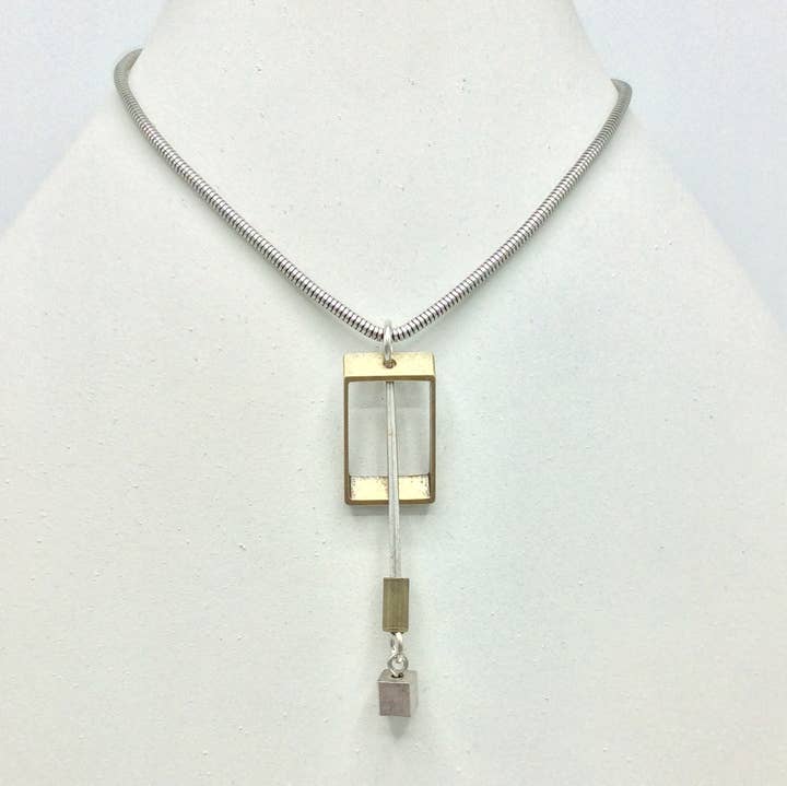 Alchemy Inc - Wholesale Pendant/Charm Necklace - Geometric Silver and Brass Plated  Necklace 47090