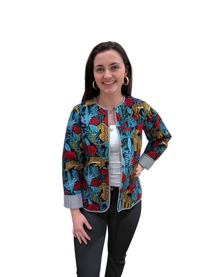 The Madeline Animal Print Quilted Reversible Jacket in Navy for wholesale by Liza Byrd