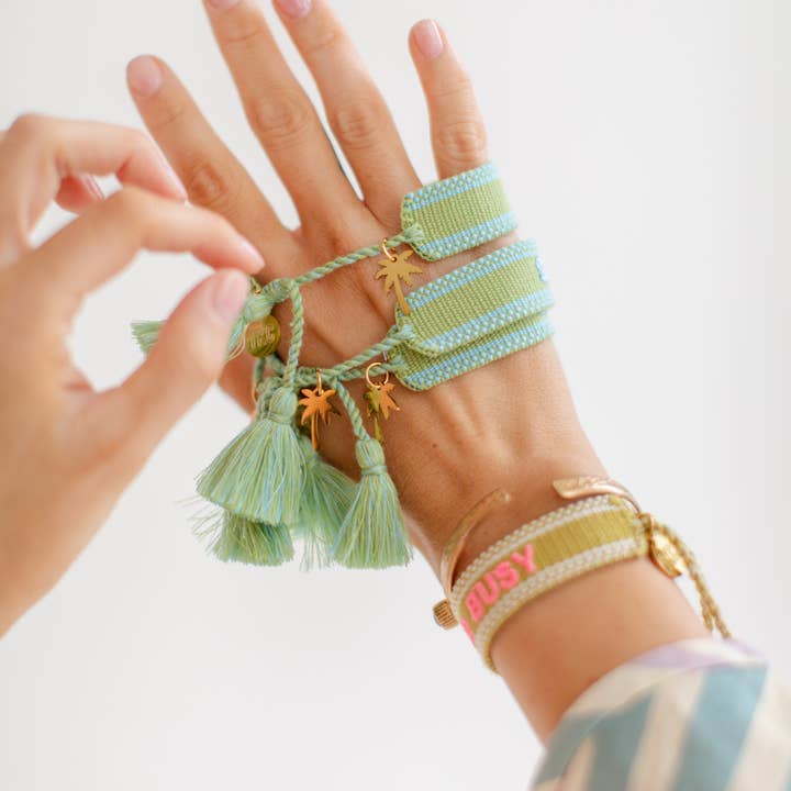 The Kenzie Collective โ wholesale Woven/braided bracelet โ Summer 2025 embroidered tassel bracelet1