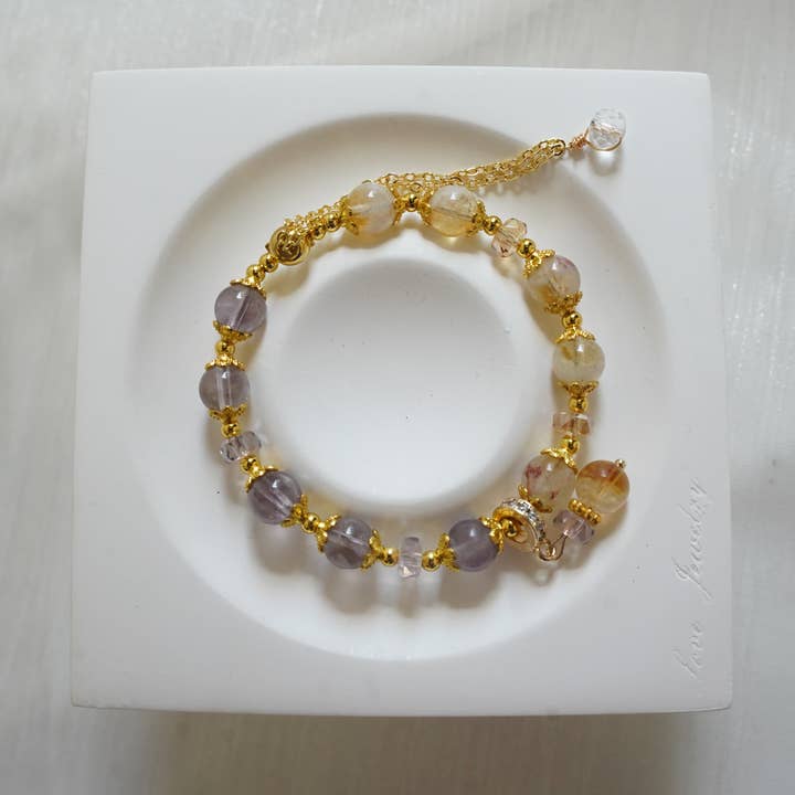 Sun Aura Bracelet – Adjustable Citrine & Amethyst Blend for wholesale by Auris Space