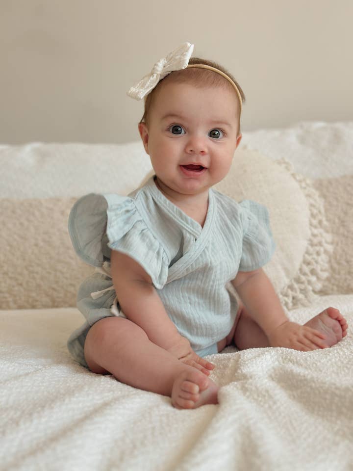 Fleur romper i blå for engroshandel hos Elke & Indigo