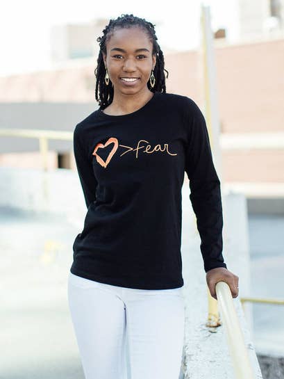 Love is Greater Than Fear Long Sleeve Unisex Tee for wholesale by Fair Anita