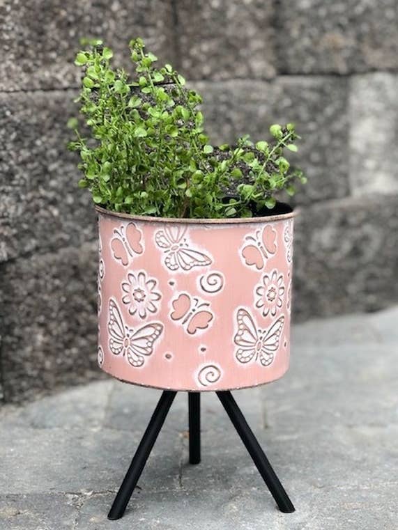 Lyserød blomsterplantekasse på stativ for engroshandel hos DNS Designs