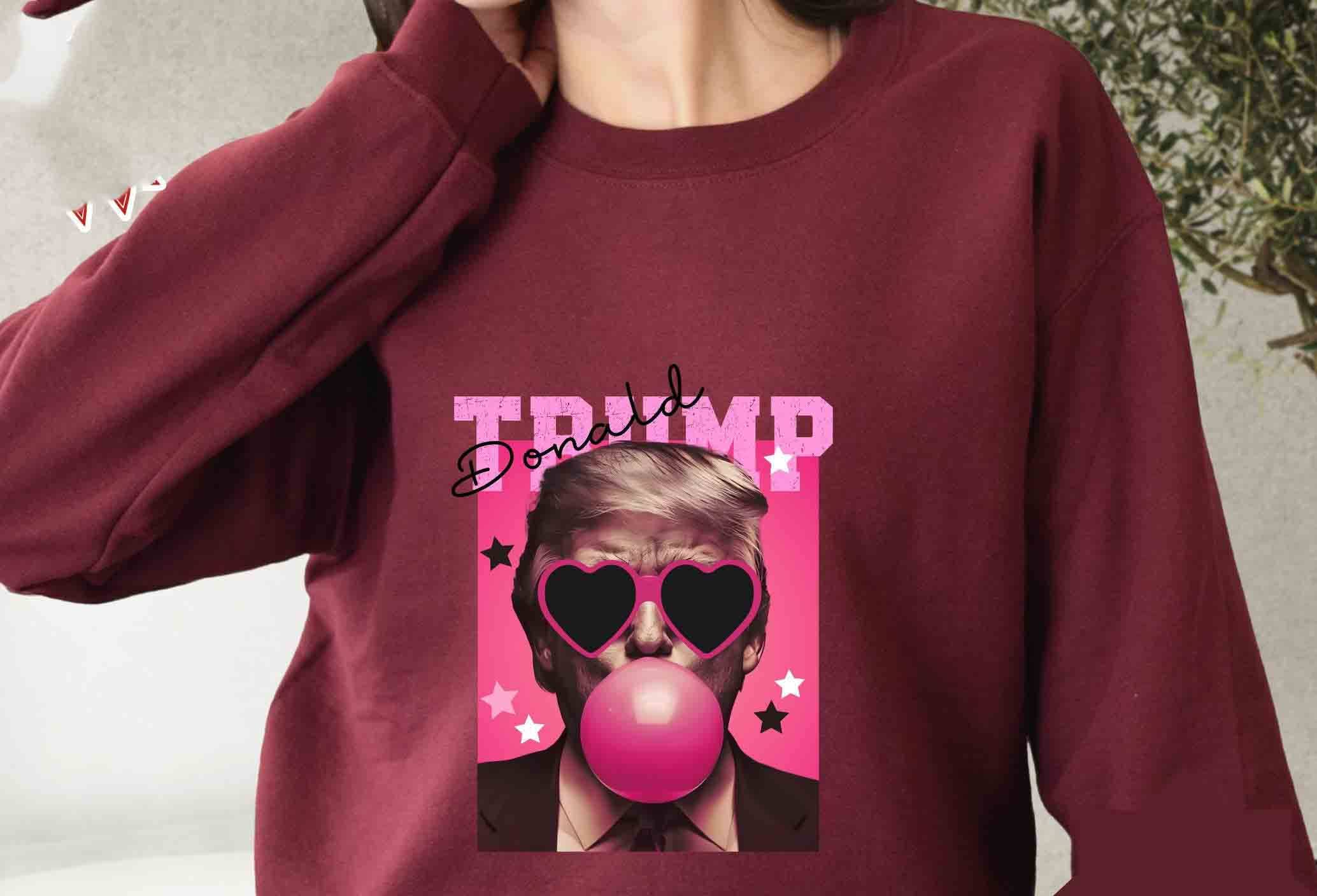 NVC Ecommerce LLC - Wholesale T-Shirt (Graphic) - Women's - Trump Bubble Gum Shirt, Trump Pink Sun Glasses Sweatshirt2